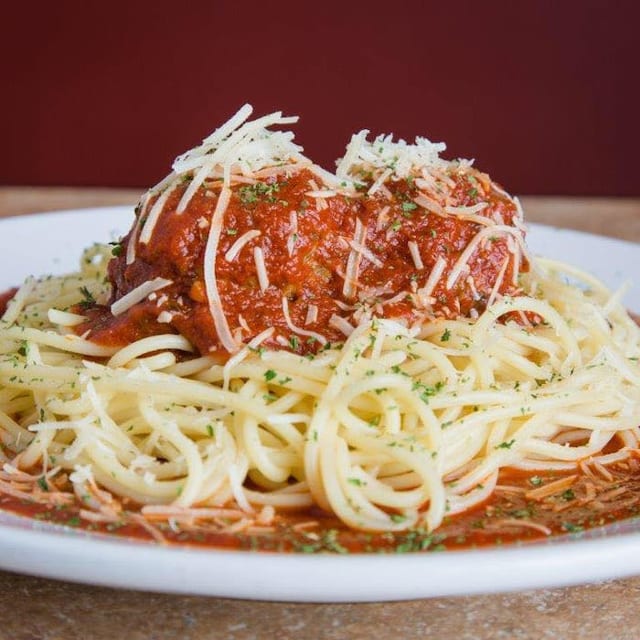Meatball Parmesan Over Spaghetti.